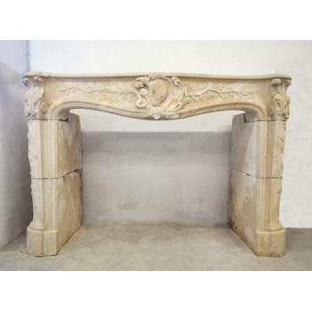 Louis XV stone fireplace