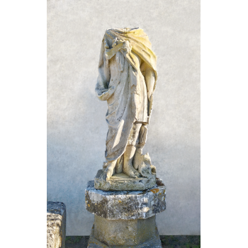 Statue of a man with a draped cape