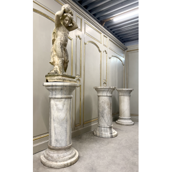 Three white marble columns