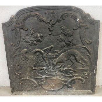 Plaque de fonte loup et cigogne