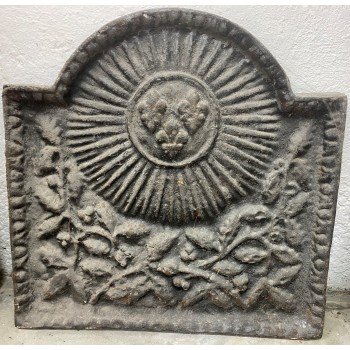 Plaque de fonte soleil